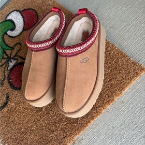 UGG women’s  Brown Slip-Ons with Red Trim